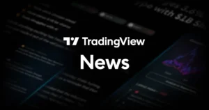 Gráfico de Bitcoin em recuperação em tela de computador, simbolizando o aumento de fluxos em ETFs.