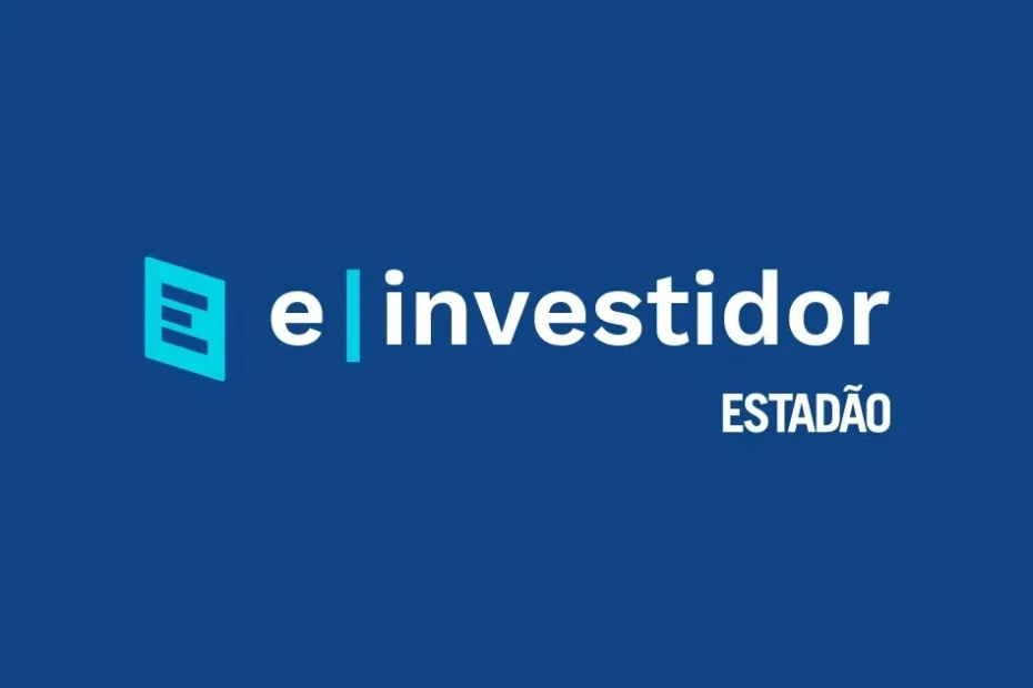 Funcionário da Caixa Econômica Federal atendendo cliente para saque de FGTS.