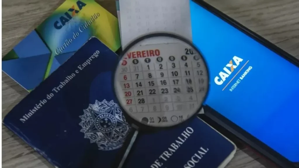 Trabalhadores recebendo o abono salarial PIS/Pasep 2026.